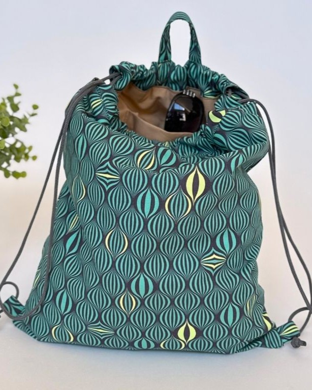 “Fabric drawstring bag sewing pattern PDF with gathered closure, ideal for handmade gifts and everyday storage.”