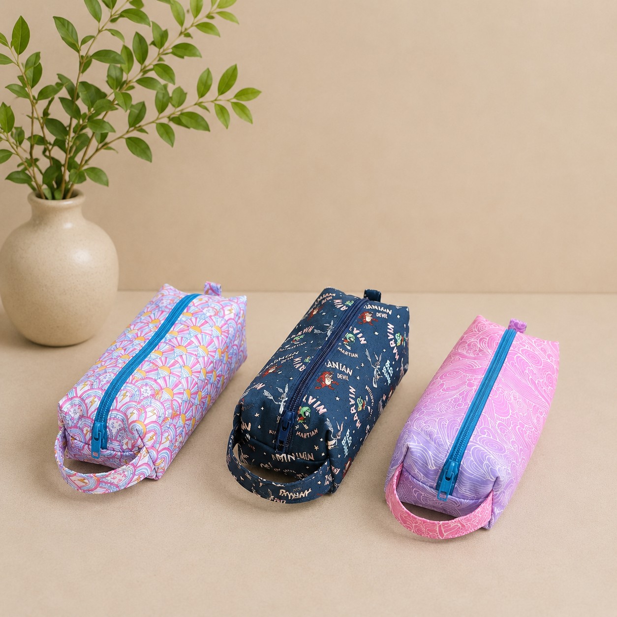 three pencil cases on the table